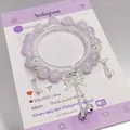 Ethereal purple crystal beaded bracelet with silver butterfly and bow charms - Bow Tassel Crystal Purple