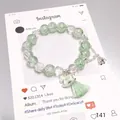 Elegant Mori style green and clear crystal bead bracelet with a cute rocking horse charm - Success Horse Bracelet Green