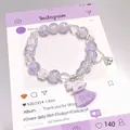Purple crackle crystal beaded bracelet with tassel and animal charms - Success Horse Bracelet Purple