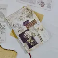 Taccuino vintage A5 in carta kraft con illustrazioni floreali e design postale. - Tema di Florescenza