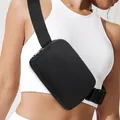 Minimalist black waterproof nylon crossbody waist bag with adjustable strap for sports - Black