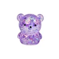 Macro view of purple glitter bear squishy toy showing shiny flakes and transparent texture - Purple