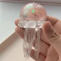 Clear translucent jellyfish squishy toy with colorful sequins for sensory stress relief - White