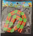 Green and orange 24-section articulated fidget chain toy shown in retail packaging - Orange + Green / 24 Segments
