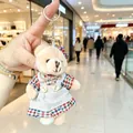 Adorable plush teddy bear charm keychain wearing a colorful checkered linen dress. - Red and White Plaid Bowknot Female Bear / 11cm