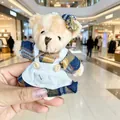 Adorable small beige teddy bear plush toy wearing a blue plaid dress and white apron - Female Bear (Dark Blue Plaid) / 11cm