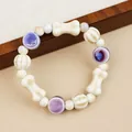 Handmade ceramic beaded bracelet with bone-shaped elements and purple star texture - Twilight Mountain Purple Starry Beads (1054-03)