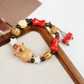 Handmade ceramic beaded bracelet with cute cartoon bear and colorful bone charms - Happy Bala M-Logo Red Hat Bear (1798-01)