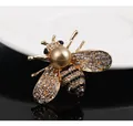 Luxury golden honey bee brooch pin featuring a large pearl and sparkling rhinestones - Golden Pearl Bee Style (XD8662-1)