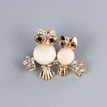 Elegant gold owl brooch featuring opal-like stones and sparkling crystal rhinestones - Double Owl Style (XD9000)