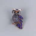 Vintage copper-toned owl brooch pin decorated with sparkling blue rhinestones for women - Blue Rhinestone Owl Style (XD8153)