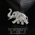 Shiny silver-tone rhinestone elephant brooch measuring 36x25mm with a weight of 11g - Silver Full Rhinestone Elephant Style (XD9270-1)