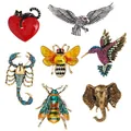 Collection of animal-themed rhinestone brooches including eagle, bee, and elephant designs - 7-Piece Animal Brooch Set (Cat Combo)
