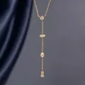 Elegant gold Y-shaped necklace with round marquise pear and baguette zircons - Tassel Pendant Y-Shaped Necklace