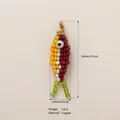 Handmade colorful beaded fish pendant with copper hardware and size details displayed - Style 5