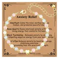 Detailansicht eines 4mm Kristall-Perlenarmbandes mit goldenem Herz auf einer Beruhigungskarte - Angstlindernd Stil 2