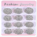 Elegant set of 12 sparkling rhinestone flower brooches presented on pink display card - 12 Styles Silver Tone White Rhinestone Large Card Brooch Set (Silver, White Diamond (Large Card))