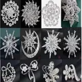 Elegant silver alloy brooches with sparkling rhinestones in floral and star designs. - 12-Piece White K Series Brooch Style (White K, 12-Piece Set As Shown)