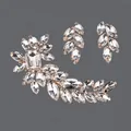 Elegant bridal jewelry set featuring a crystal flower hair clip and matching leaf earrings. - Rhinestone Versatile Commute Clip (HS-J6767G)