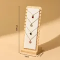 Professional wooden necklace display stand with 10 slots measuring 27.3x10x9.5cm - 12-Slot Beige (Bamboo Stand)