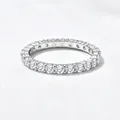 Macro detail of a 925 sterling silver eternity ring with sparkling ice flower cut zircons - US 5 / Style KR2801 / Platinum