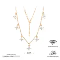 Vue détaillée du collier en argent sterling S925 doré avec élégants pendentifs fleur en zircon - Argent 925 plaqué or jaune / Doré