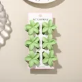 Set of six matcha green plumeria flower hair claw clips with matte finish on card - 4cm Frangipani Style / 6-Piece Set (Bulk) / Grass Green