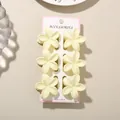 Pack of 6 pale yellow plumeria flower hair claw clips for elegant women's styling - 4cm Frangipani Style / 6-Piece Set (Bulk) / White