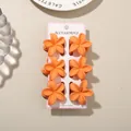 Set of 6 vibrant matte orange plumeria flower hair claw clips on a display card - 4cm Frangipani Style / 6-Piece Set (Bulk) / Orange
