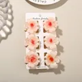 Set of six elegant pink frangipani floral hair claw clips presented on a white display card - 4cm Heart Petal Style / Set of 6 / Orange Red