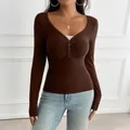 Slim fit brown long sleeve Y2K top with button front detail and deep V-neckline. - XS / Brown