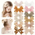 Handmade children's hair bow clips set with floral embroidery and gingham patterns - Set of 12 Pieces