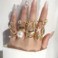 Set of 11 vintage gold rings featuring pearls, starfish, and shells for a boho style look. - 11-Piece Gold Ocean Theme Artificial Pearl Set (32715-ring-G-EP)