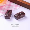 Detailed view of 1.5x2.7cm resin chocolate charms for DIY phone cases and jewelry craft - New 'Love' Style - Dark Coffee