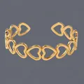 18K gold plated stainless steel cuff bracelet with repeating hollow heart design - Hollow Connected Hearts(BS-J5563G) / Gold