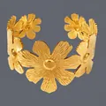 18K gold-plated stainless steel open cuff bracelet featuring irregular daisy floral shapes - Large Daisy Shape(BS-J5553G)