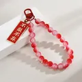 Elegant red and pink gradient beaded keychain charm with Chinese message tag for bags - Never Leave (Red Beads Style)
