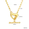 Detailed macro view of a gold stainless steel beaded chain with a heart pendant - Heart Toggle Clasp Bead Chain Style (NE2F7301G)
