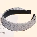 Elegant grey braided faux leather headband with a non-slip lining for women's hair styling - Wide Gray Style