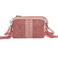 Bohemian dusty rose fringe crossbody bag featuring floral embossing and metal studs - Peach