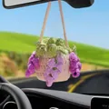 Close-up of a handmade crochet flower pot hanging ornament for car rearview mirror - Purple Grape Flower Basket
