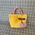 Cute yellow faux fur handbag featuring a pink braided handle and cherry pom pom charm - Ginger Yellow / 28*30cm