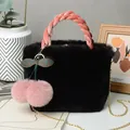 Stylish black faux fur cherry bag featuring a pink braided handle and elegant gold chain strap - Black / 28*30cm