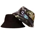 Stylish reversible bucket hat featuring a solid black side and an urban graphic print - Graffiti Pattern (CH-24)