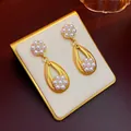 Elegant vintage court style gold teardrop earrings featuring delicate pearl flower clusters - Gold Pearl Flower Drop Earrings (Silver Earring Post)
