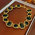 Vintage palace style necklace with black crystals in elegant gold-tone textured frames - Gold Black Faceted Crystal Necklace