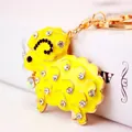 Cute yellow sheep keychain with sparkling rhinestones and gold-toned metal chain - Yellow