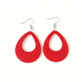 Detail view of minimalist bright red teardrop-shaped acrylic earrings for women - Red
