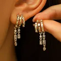 Stylish gold tassel hoop earrings with sparkling cubic zirconia for women's jewelry collection. - Style 2 (5889) / Gold