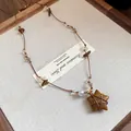 French vintage brown cord necklace with tiger eye star pendant and white pearl detail - Vintage Star Pendant Necklace (Coffee)